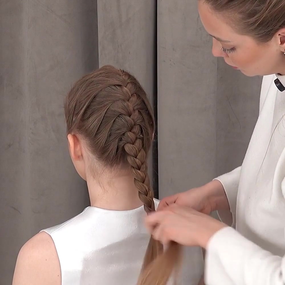 The remaining length is finished as a regular three-strand braid