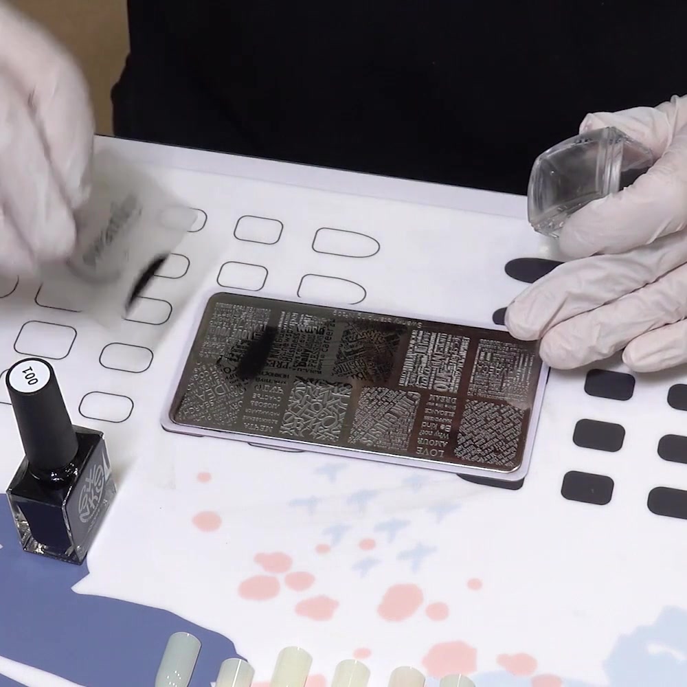 One quick scraper pass removes extra black polish from the plate